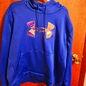 Royal blue Underarmour hoodie with iridescent emblem.